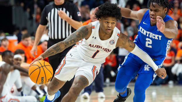 Auburn Tigers guard Wendell Green Jr. (1) drives the ball as Auburn Tigers men's basketball takes on Kentucky Wildcats at Auburn Arena in Auburn, Ala., on Saturday, Jan. 22, 2022. Kentucky lead Auburn 33-29 at halftime, but the Tigers came out hot and held on for an 80-71 victory.